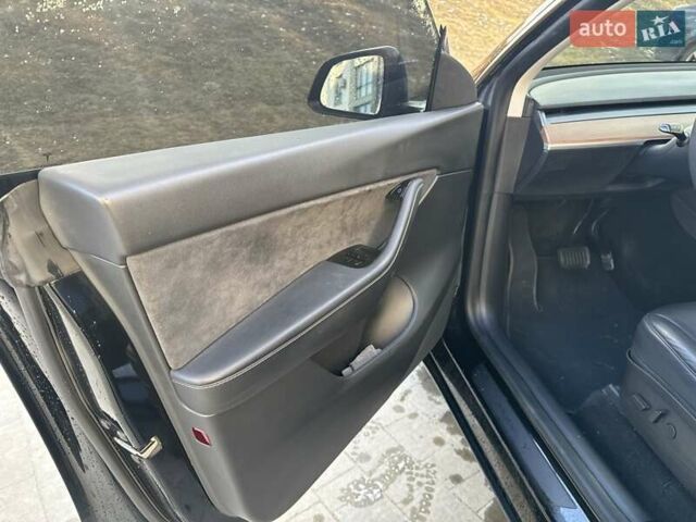 Черный Тесла Model Y, объемом двигателя 0 л и пробегом 59 тыс. км за 24900 $, фото 49 на Automoto.ua