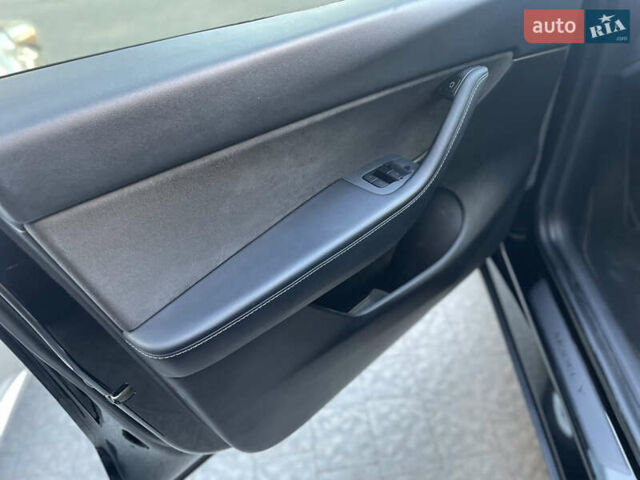 Черный Тесла Model Y, объемом двигателя 0 л и пробегом 77 тыс. км за 22700 $, фото 11 на Automoto.ua
