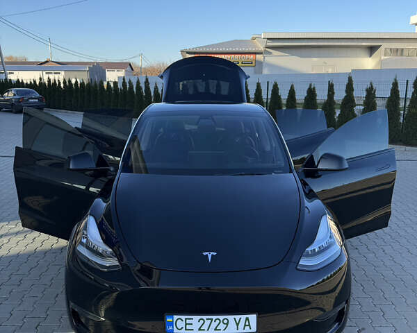 Черный Тесла Model Y, объемом двигателя 0 л и пробегом 54 тыс. км за 25900 $, фото 18 на Automoto.ua