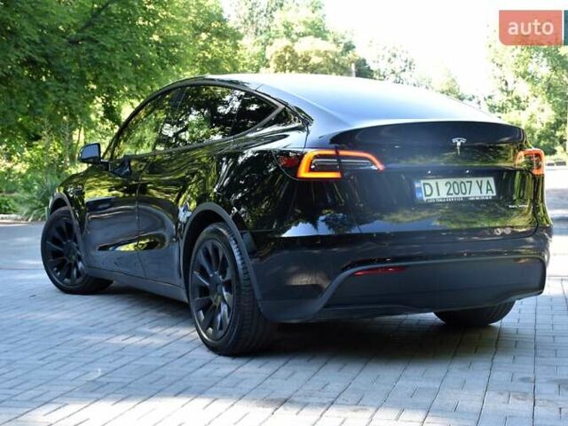 Черный Тесла Model Y, объемом двигателя 0 л и пробегом 82 тыс. км за 24950 $, фото 12 на Automoto.ua