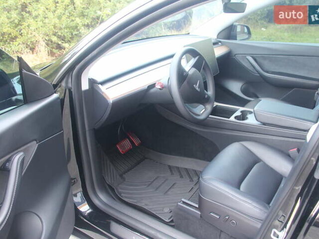 Черный Тесла Model Y, объемом двигателя 0 л и пробегом 56 тыс. км за 27499 $, фото 11 на Automoto.ua