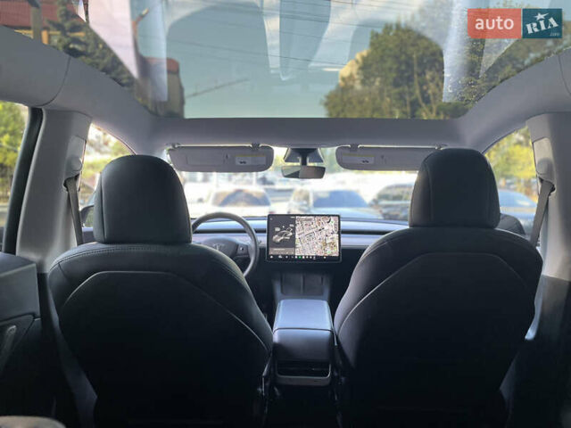 Черный Тесла Model Y, объемом двигателя 0 л и пробегом 77 тыс. км за 22700 $, фото 14 на Automoto.ua