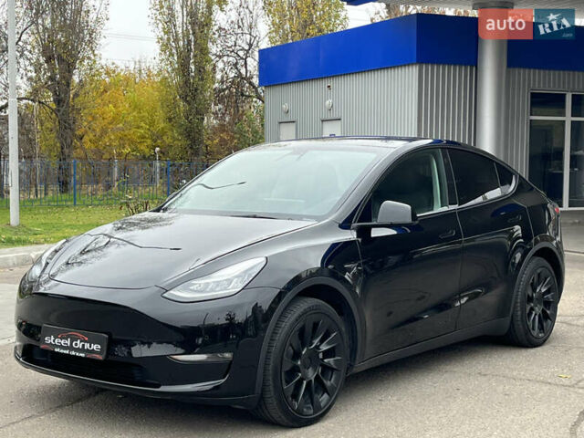 Черный Тесла Model Y, объемом двигателя 0 л и пробегом 5 тыс. км за 24999 $, фото 1 на Automoto.ua