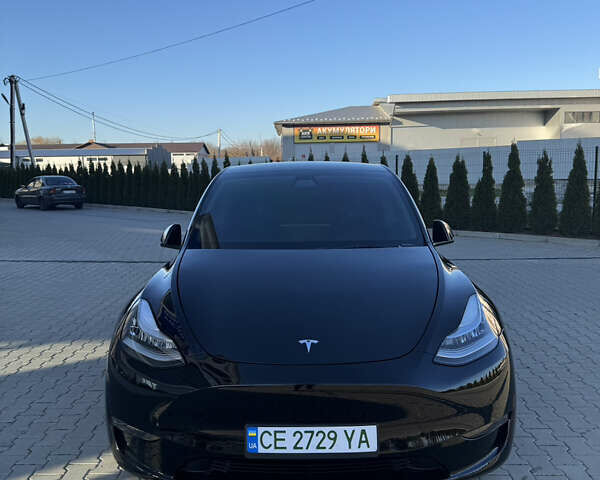 Черный Тесла Model Y, объемом двигателя 0 л и пробегом 54 тыс. км за 25900 $, фото 1 на Automoto.ua