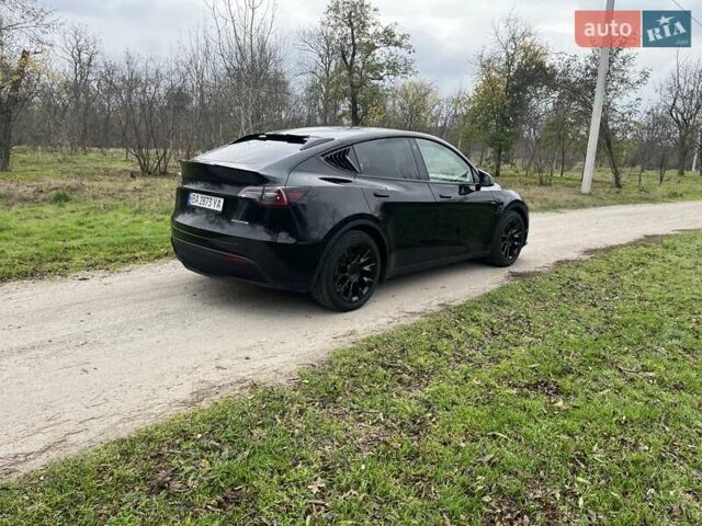 Черный Тесла Model Y, объемом двигателя 0 л и пробегом 85 тыс. км за 23500 $, фото 6 на Automoto.ua