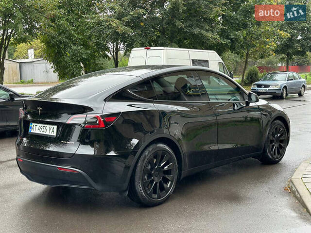 Черный Тесла Model Y, объемом двигателя 0 л и пробегом 82 тыс. км за 26000 $, фото 6 на Automoto.ua