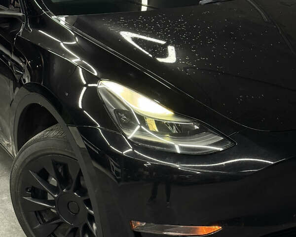 Черный Тесла Model Y, объемом двигателя 0 л и пробегом 124 тыс. км за 24900 $, фото 2 на Automoto.ua