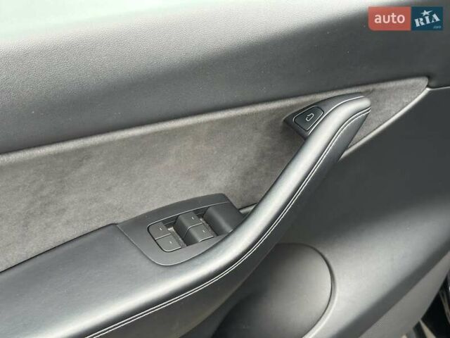 Черный Тесла Model Y, объемом двигателя 0 л и пробегом 127 тыс. км за 26990 $, фото 14 на Automoto.ua