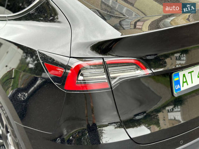 Черный Тесла Model Y, объемом двигателя 0 л и пробегом 82 тыс. км за 26000 $, фото 7 на Automoto.ua