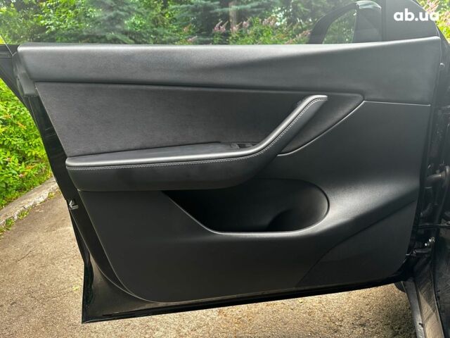 Черный Тесла Model Y, объемом двигателя 0 л и пробегом 136 тыс. км за 23990 $, фото 8 на Automoto.ua