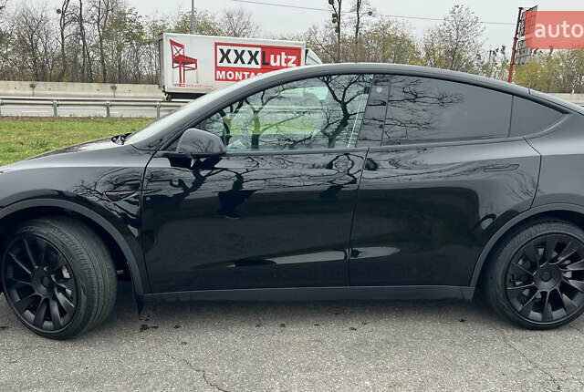 Черный Тесла Model Y, объемом двигателя 0 л и пробегом 97 тыс. км за 19999 $, фото 5 на Automoto.ua