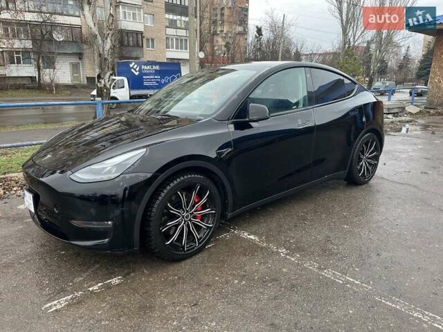 Черный Тесла Model Y, объемом двигателя 0 л и пробегом 90 тыс. км за 32818 $, фото 1 на Automoto.ua