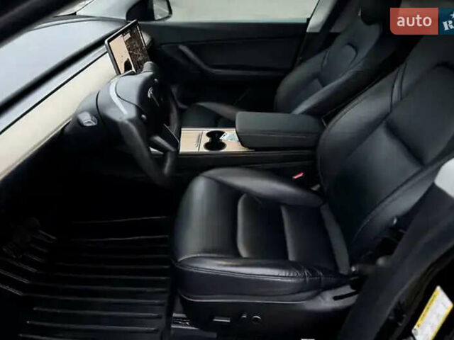 Черный Тесла Model Y, объемом двигателя 0 л и пробегом 162 тыс. км за 25700 $, фото 2 на Automoto.ua