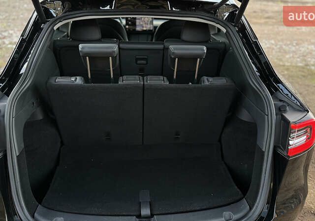 Черный Тесла Model Y, объемом двигателя 0 л и пробегом 80 тыс. км за 24700 $, фото 10 на Automoto.ua