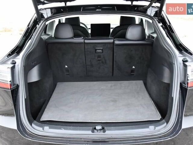 Черный Тесла Model Y, объемом двигателя 0 л и пробегом 91 тыс. км за 25300 $, фото 45 на Automoto.ua