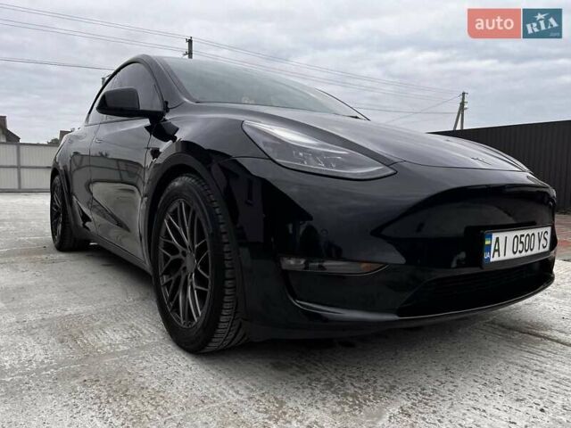 Чорний Тесла Model Y, об'ємом двигуна 0 л та пробігом 73 тис. км за 27999 $, фото 1 на Automoto.ua