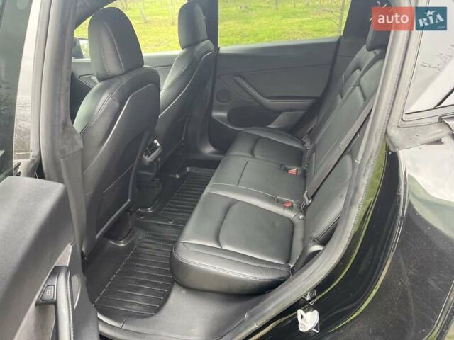 Черный Тесла Model Y, объемом двигателя 0 л и пробегом 85 тыс. км за 23500 $, фото 18 на Automoto.ua