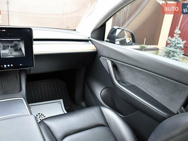 Черный Тесла Model Y, объемом двигателя 0 л и пробегом 73 тыс. км за 25950 $, фото 33 на Automoto.ua