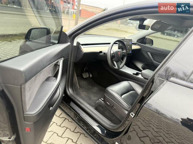 Черный Тесла Model Y, объемом двигателя 0 л и пробегом 55 тыс. км за 26300 $, фото 11 на Automoto.ua