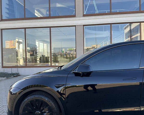 Черный Тесла Model Y, объемом двигателя 0 л и пробегом 54 тыс. км за 25900 $, фото 3 на Automoto.ua