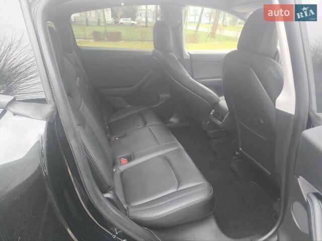 Чорний Тесла Model Y, об'ємом двигуна 0 л та пробігом 77 тис. км за 23900 $, фото 28 на Automoto.ua