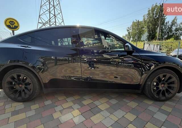 Чорний Тесла Model Y, об'ємом двигуна 0 л та пробігом 51 тис. км за 27300 $, фото 7 на Automoto.ua