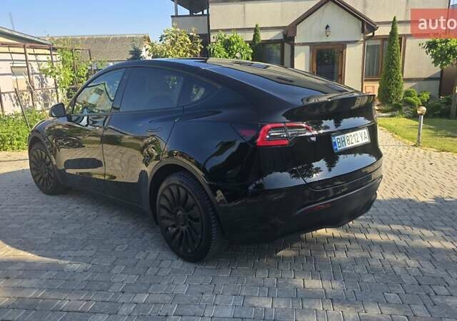 Черный Тесла Model Y, объемом двигателя 0 л и пробегом 98 тыс. км за 24700 $, фото 6 на Automoto.ua