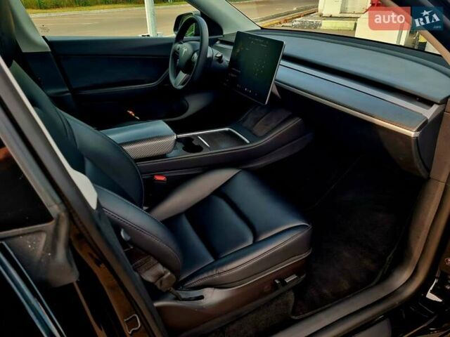 Черный Тесла Model Y, объемом двигателя 0 л и пробегом 128 тыс. км за 29999 $, фото 10 на Automoto.ua