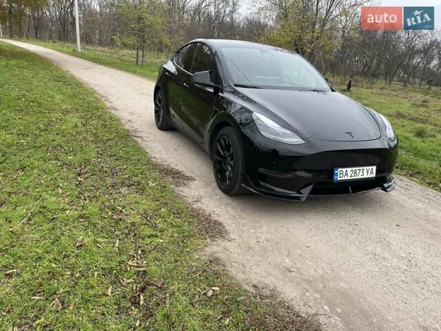 Черный Тесла Model Y, объемом двигателя 0 л и пробегом 85 тыс. км за 23500 $, фото 1 на Automoto.ua