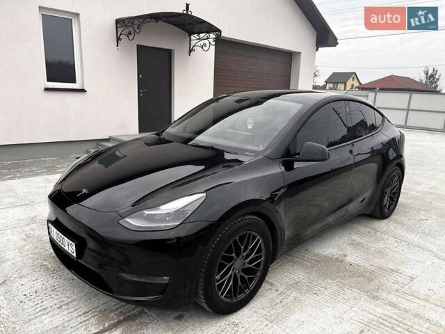 Чорний Тесла Model Y, об'ємом двигуна 0 л та пробігом 73 тис. км за 27999 $, фото 2 на Automoto.ua
