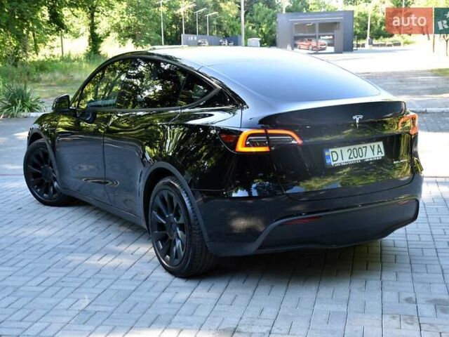 Черный Тесла Model Y, объемом двигателя 0 л и пробегом 82 тыс. км за 24950 $, фото 10 на Automoto.ua