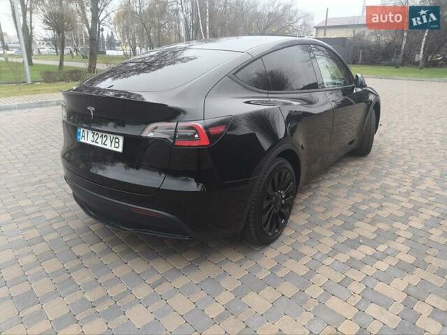 Чорний Тесла Model Y, об'ємом двигуна 0 л та пробігом 77 тис. км за 23900 $, фото 7 на Automoto.ua