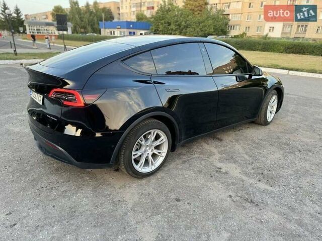 Черный Тесла Model Y, объемом двигателя 0 л и пробегом 101 тыс. км за 23999 $, фото 16 на Automoto.ua