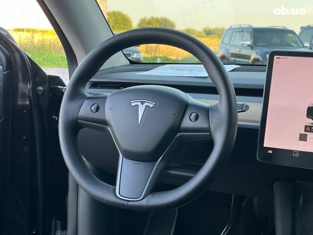 Черный Тесла Model Y, объемом двигателя 0 л и пробегом 73 тыс. км за 27890 $, фото 32 на Automoto.ua