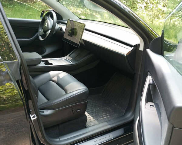 Черный Тесла Model Y, объемом двигателя 0 л и пробегом 90 тыс. км за 29000 $, фото 9 на Automoto.ua