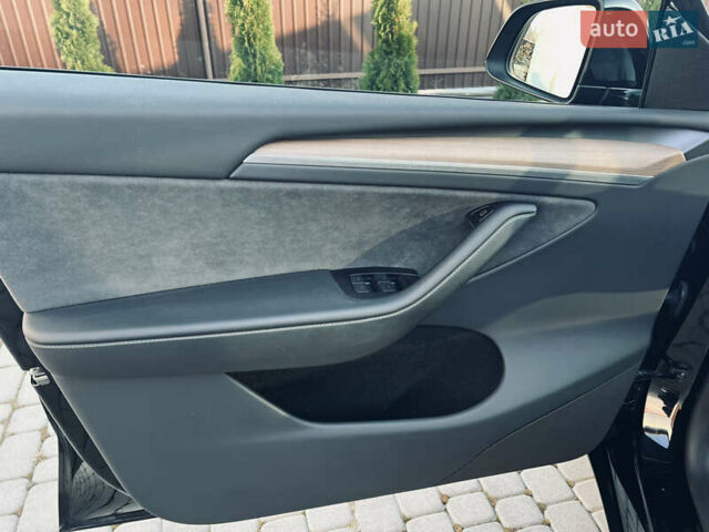Черный Тесла Model Y, объемом двигателя 0 л и пробегом 100 тыс. км за 28900 $, фото 30 на Automoto.ua
