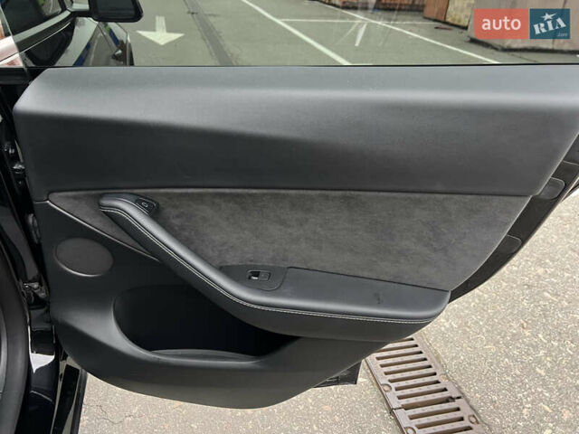 Черный Тесла Model Y, объемом двигателя 0 л и пробегом 61 тыс. км за 22900 $, фото 26 на Automoto.ua