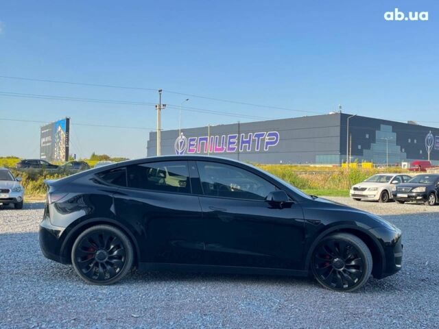 Черный Тесла Model Y, объемом двигателя 0 л и пробегом 73 тыс. км за 27890 $, фото 4 на Automoto.ua