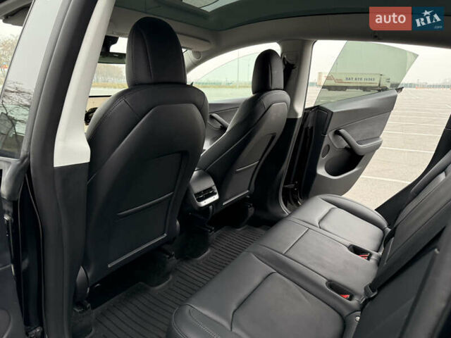 Черный Тесла Model Y, объемом двигателя 0 л и пробегом 22 тыс. км за 27999 $, фото 24 на Automoto.ua