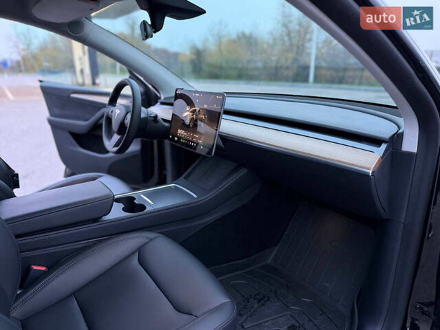 Черный Тесла Model Y, объемом двигателя 0 л и пробегом 53 тыс. км за 34999 $, фото 23 на Automoto.ua