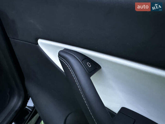 Черный Тесла Model Y, объемом двигателя 0 л и пробегом 85 тыс. км за 28000 $, фото 40 на Automoto.ua