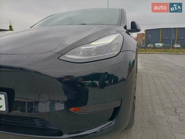 Черный Тесла Model Y, объемом двигателя 0 л и пробегом 52 тыс. км за 26300 $, фото 1 на Automoto.ua