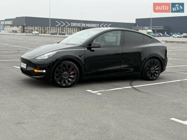 Черный Тесла Model Y, объемом двигателя 0 л и пробегом 22 тыс. км за 27999 $, фото 2 на Automoto.ua