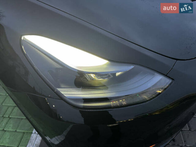 Черный Тесла Model Y, объемом двигателя 0 л и пробегом 85 тыс. км за 28000 $, фото 44 на Automoto.ua