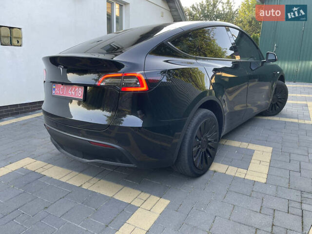 Черный Тесла Model Y, объемом двигателя 0 л и пробегом 67 тыс. км за 27500 $, фото 28 на Automoto.ua