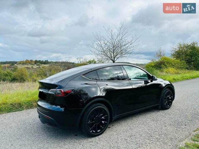 Черный Тесла Model Y, объемом двигателя 0 л и пробегом 10 тыс. км за 28999 $, фото 1 на Automoto.ua