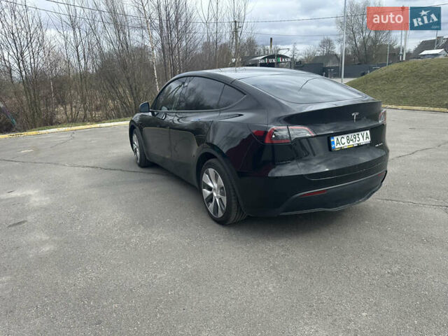 Черный Тесла Model Y, объемом двигателя 0 л и пробегом 24 тыс. км за 27999 $, фото 5 на Automoto.ua
