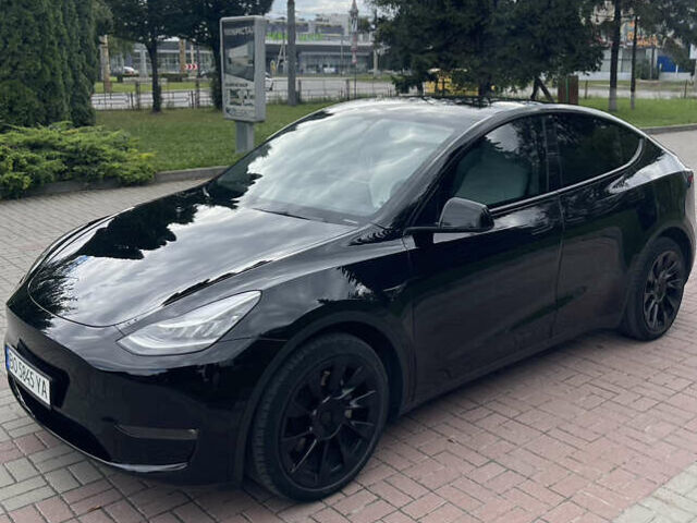 Черный Тесла Model Y, объемом двигателя 0 л и пробегом 89 тыс. км за 26999 $, фото 4 на Automoto.ua