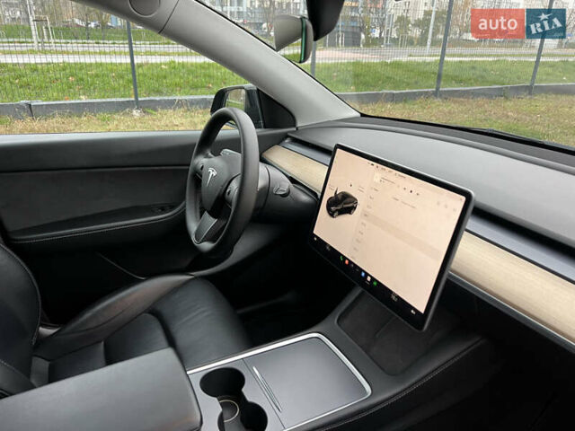 Черный Тесла Model Y, объемом двигателя 0 л и пробегом 61 тыс. км за 22900 $, фото 21 на Automoto.ua
