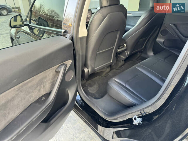 Черный Тесла Model Y, объемом двигателя 0 л и пробегом 48 тыс. км за 28999 $, фото 26 на Automoto.ua